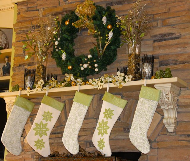 A Woodland-themed Green, Cream, and Brown Fireplace Mantel, with a touch of gold-kissed Dogwood blossoms for a Southern touch!