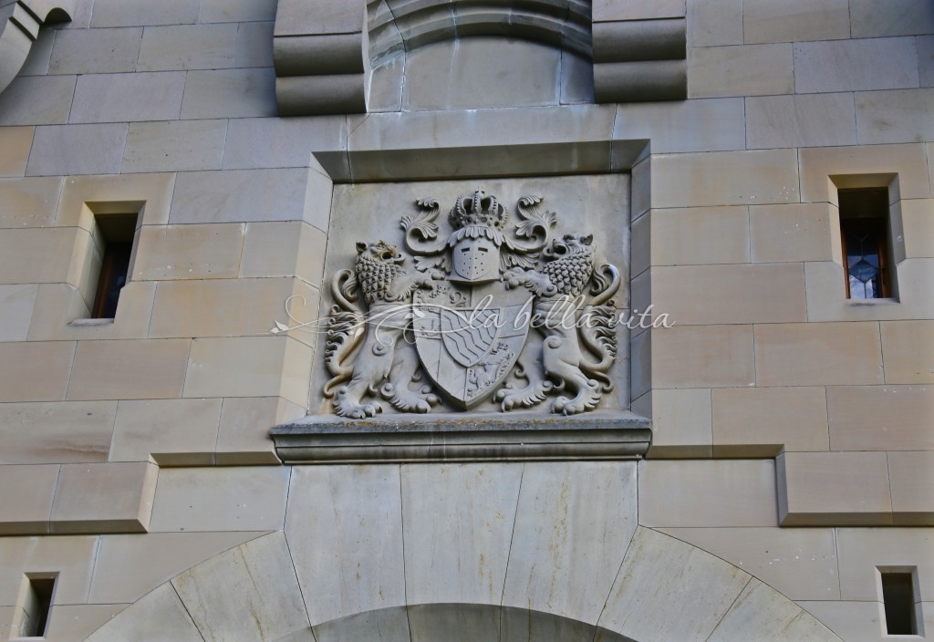 carved coat of arms