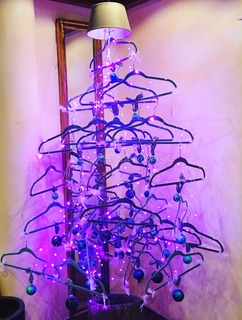 a unique 'Christmas Tree' made up of clothes hangers -- one of the delightful and unexpected visual displays at Hotel Sonne