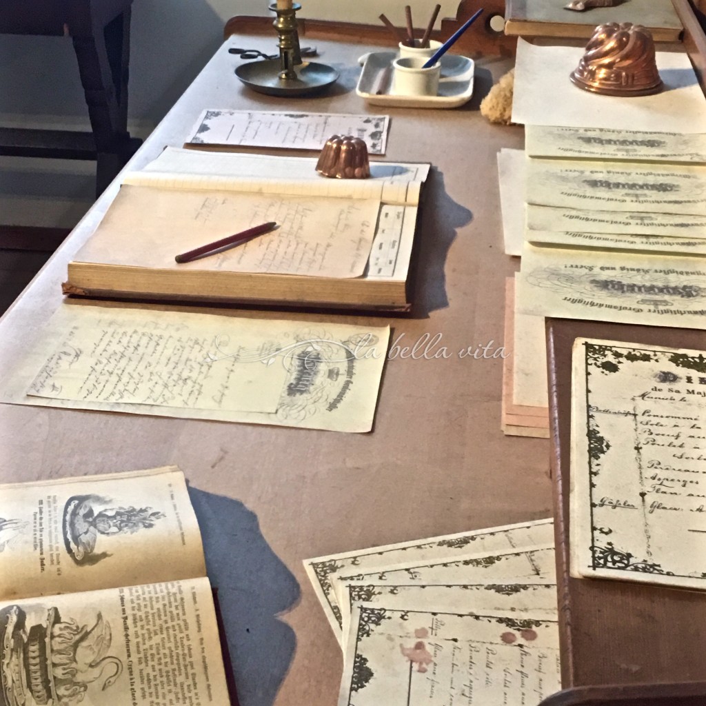 The kitchen desk with notes and cookbooks from the royal chef of the king.